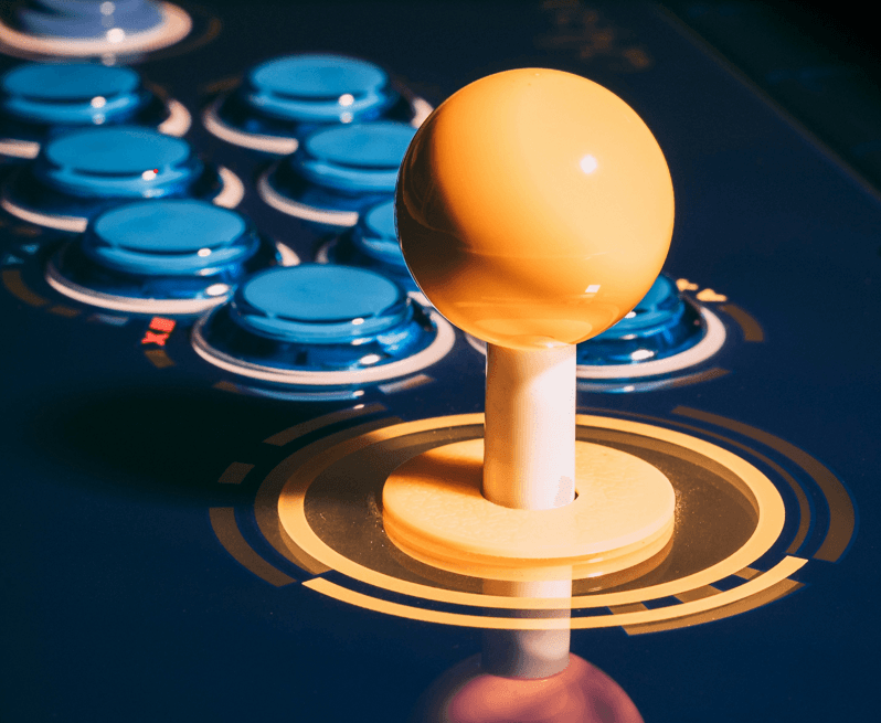 Arcade fightstick with yellow joystick and blue buttons